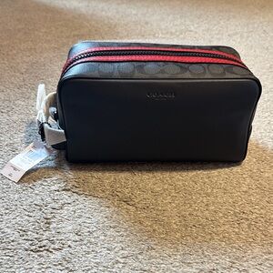 Coach Black Toiletry Bag with Red Accent